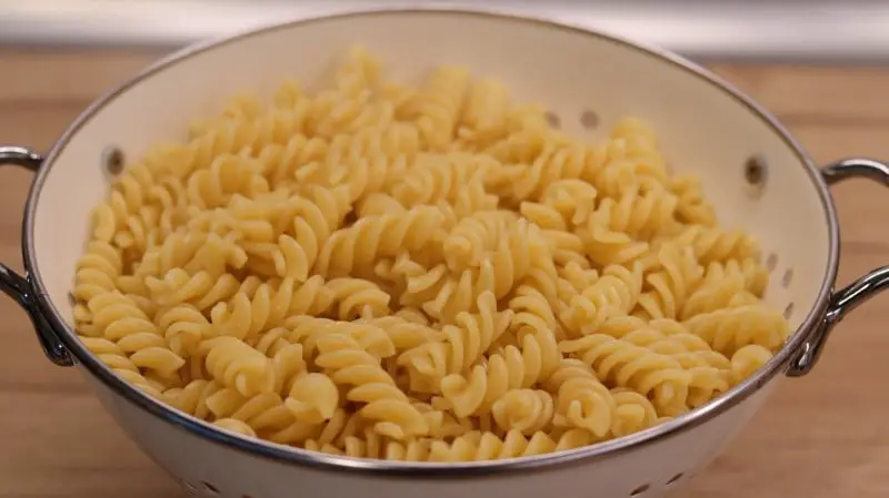 Fusilli pasta in colander