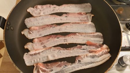 Bacon slices in pan