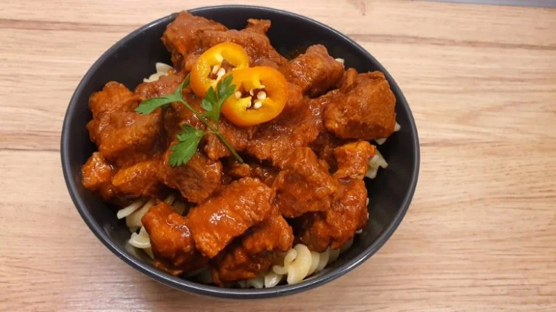 Pork goulash served with fusilli