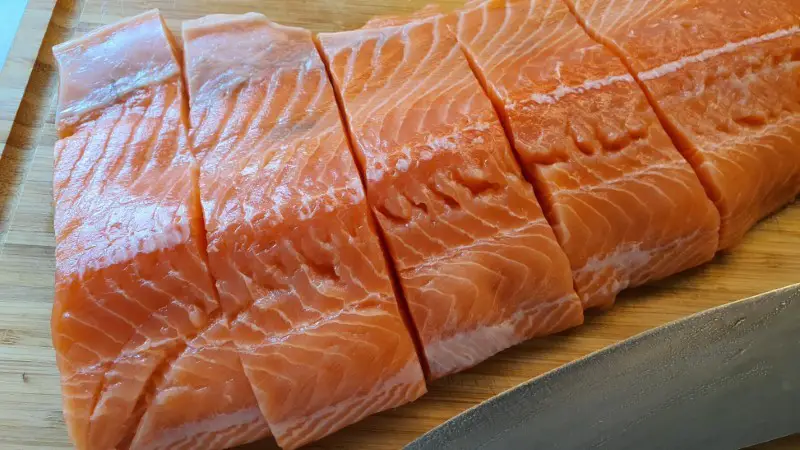 Salmon cut into fillets