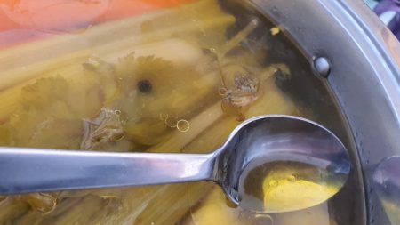 Skimming whole chicken soup excess fat